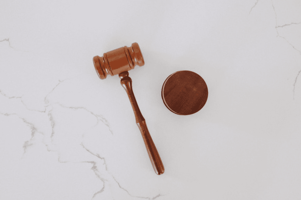A gavel on a marble surface
