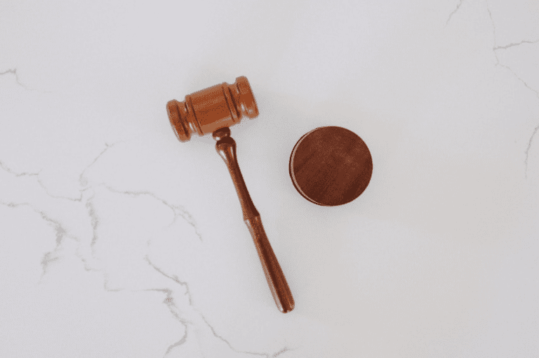 A gavel on a marble surface