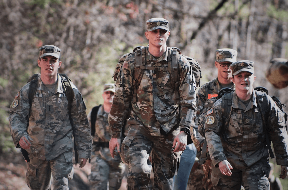 Soldiers walking together during training at base camp